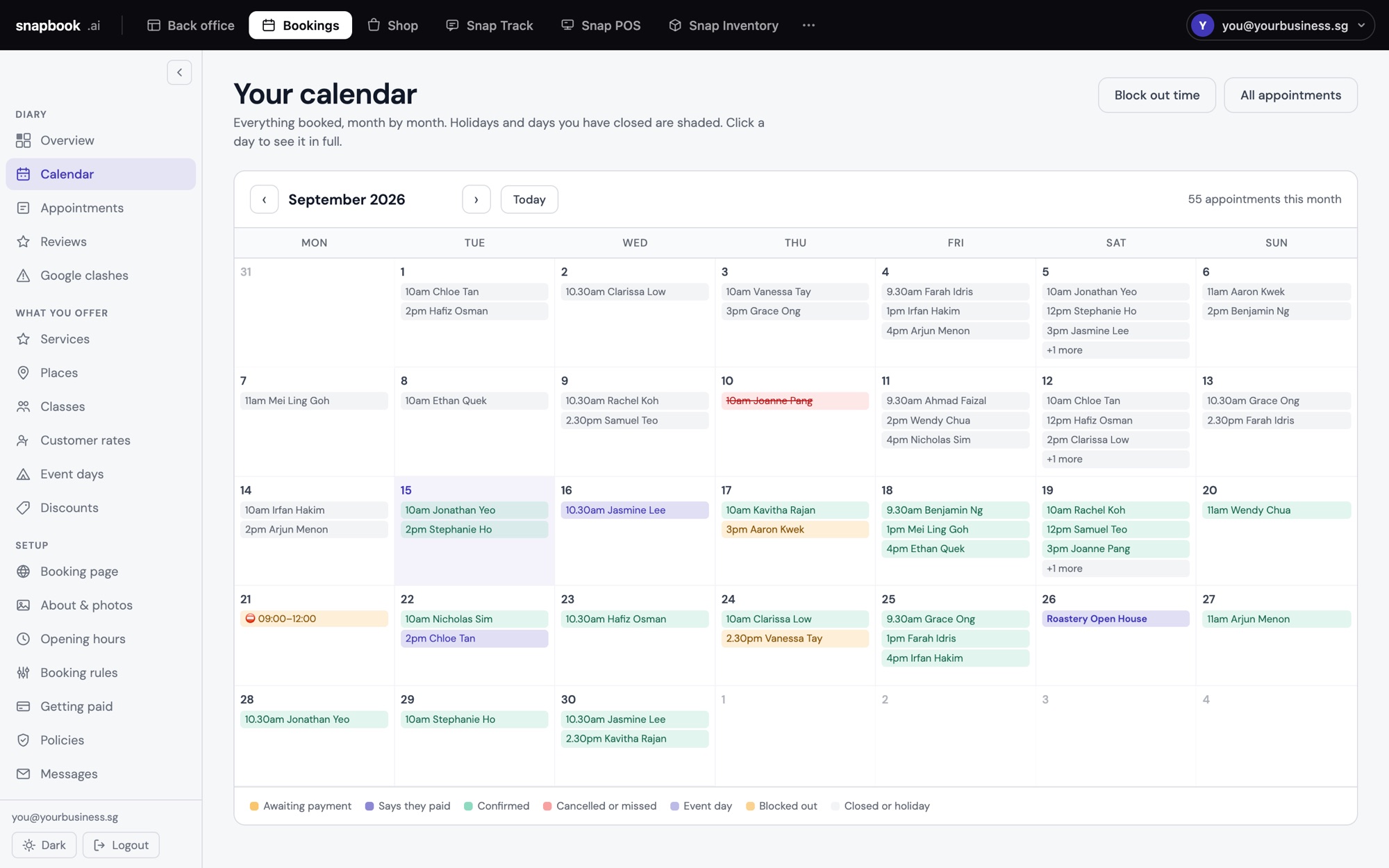 The app.kevinchia.sg bookings calendar: a month of appointments, coloured by paid, waiting and cancelled
